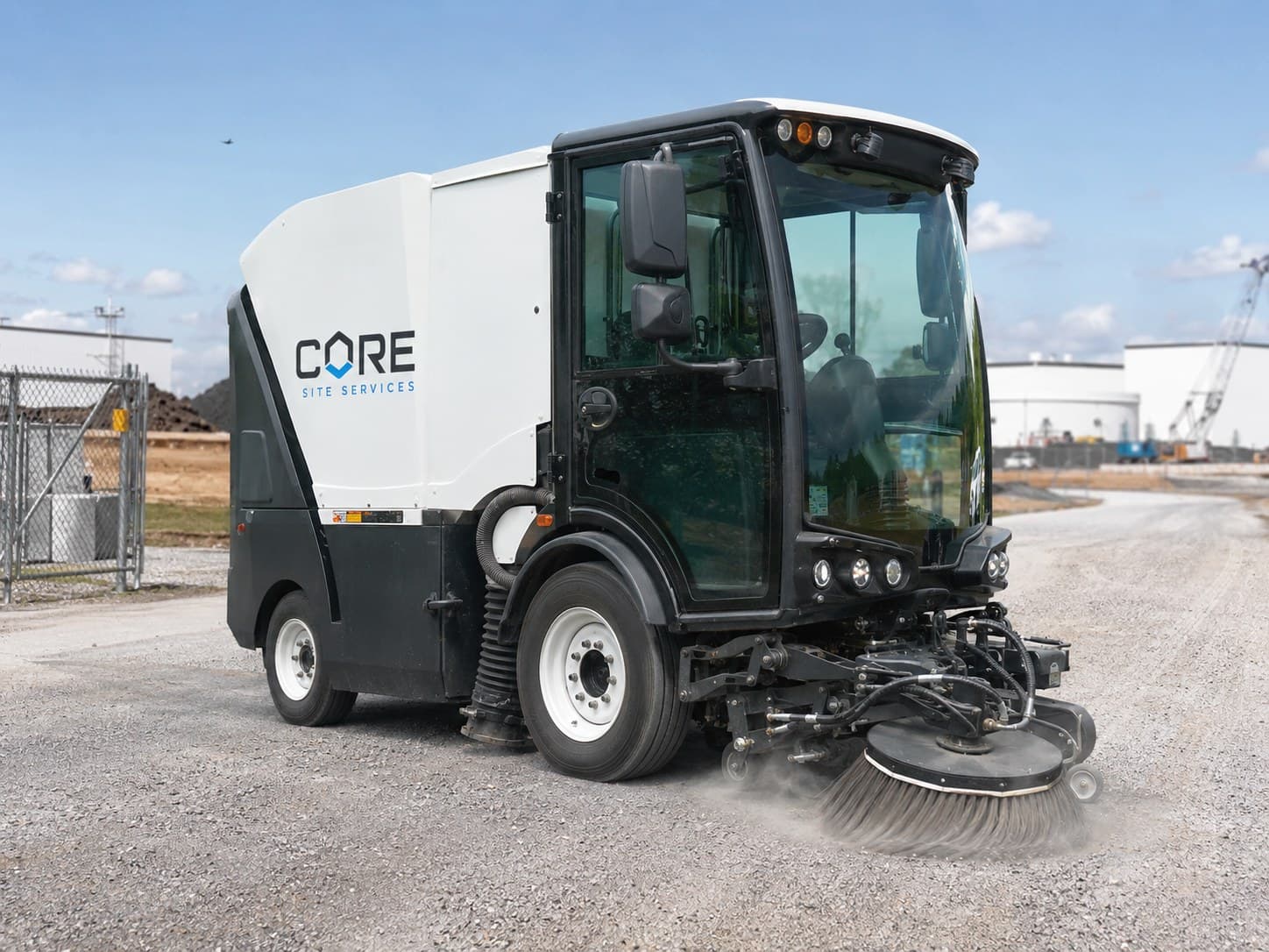 CORE Site Services street sweeper clearing a construction access road